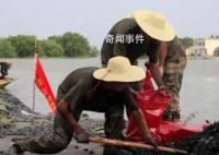 做抗洪救災重建家園的主人 不畏艱險守望相助