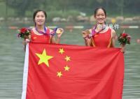 奪得首金的中國姑娘雙手滿是老繭 水泡破掉成型后又磨破一層又一層