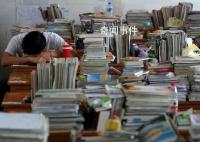 媒體:給學生減負也要給教師減負